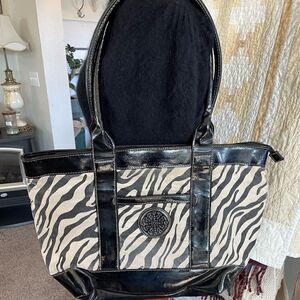 Pre-Owed Treviso Animal Print Tote with White Gold Accents